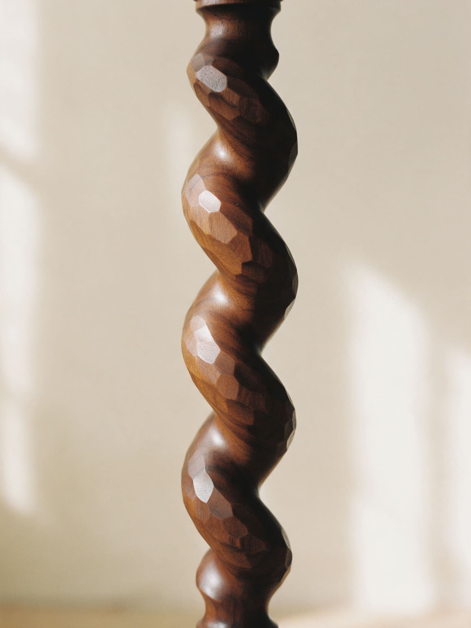 A barley-twist leg, the facets cut by hand with a rasp