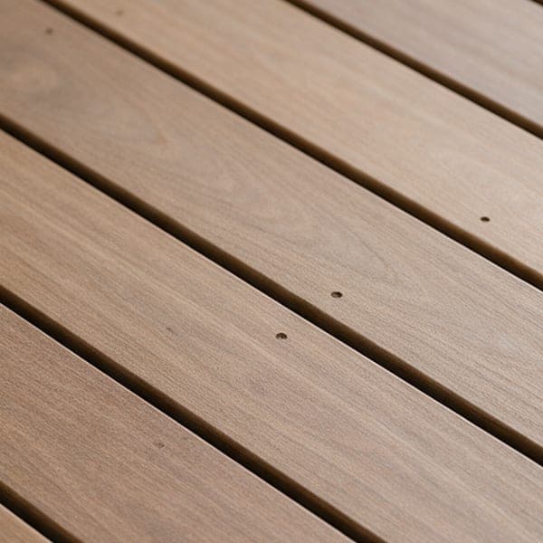 Thermally modified ash deck boards with even gaps.