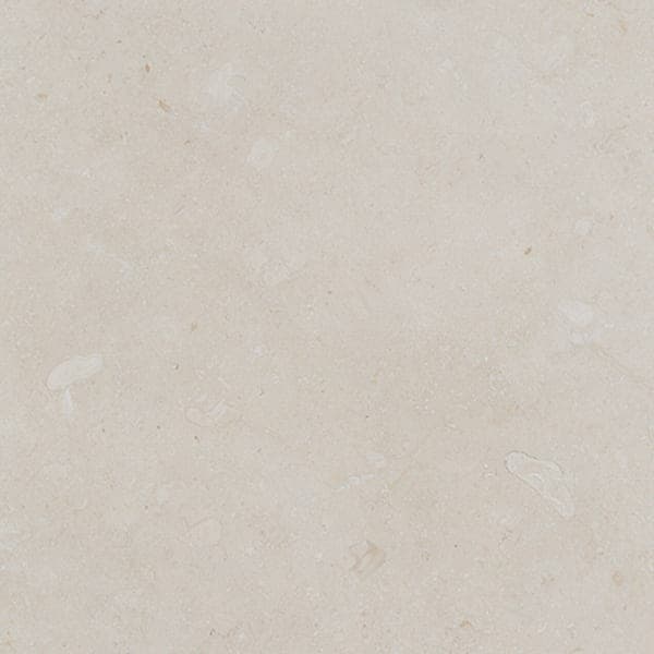 A honed pale limestone floor tile.