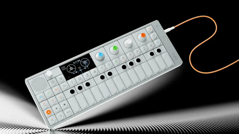 OP-1 study: white synthesizer with an orange cable on black, CG render